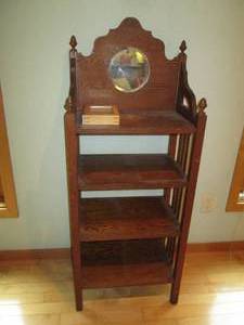Vintage carved wood tower shelf wit...