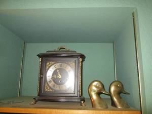 lot 9 image: Vintage mantel clock plus brass dec...