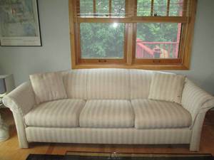 lot 15 image: Cream striped 3-cushion sofa with m...