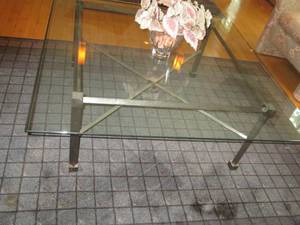 lot 18 image: Metal framed glass top coffee table...