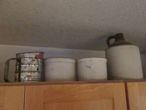 lot 168 image: Stoneware crocks and sifter...