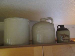 lot 169 image: Stoneware pitchers and crock...