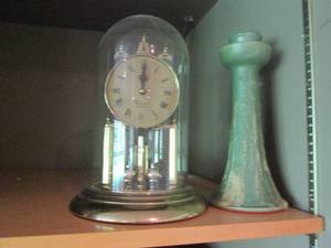 lot 239 image: Clock and vase...