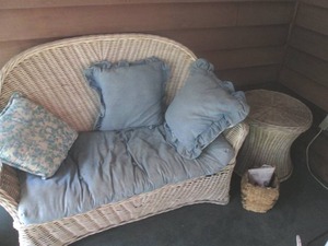 lot 255 image: Wicker love seat and side table...