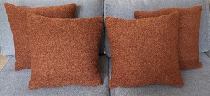 lot 102 image: Four Orange Accent Pillows