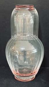lot 74 image: Vintage Morgantown Glass Palm Optic Pink Carafe and Glass Tumble Up Set