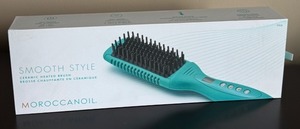 lot 142 image: Gently Used Moroccanoil Smooth Style Ceramic Heated Brush