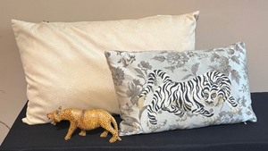 lot 153 image: Two Pretty Accent Pillows with Jaguar Figurine
