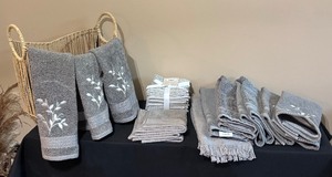 lot 156 image: Lovely Towels and Decorative Basket