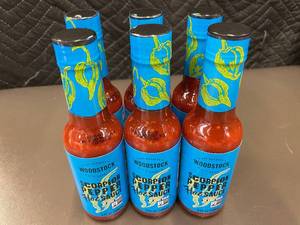 lot 400 image: NE2 - Set of 6 Woodstock Scorpion Pepper Hot Sauce Bottles (5 fl oz each)