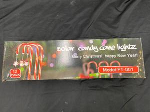 lot 23 image: 12 Pack Solar Candy Cane Lightz with 1000mAh Battery