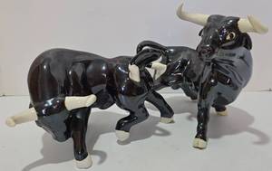 lot 153 image: Pair of Glazed Ceramic Decorative Bulls