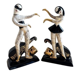lot 32 image: Set of 2 MCM Art Deco Harlequin Dancer Figurines by Heidi Schoop