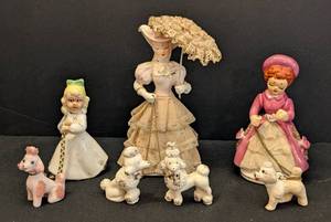 lot 262 image: Three Vintage Porcelain Dog Walking Figurines