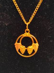 lot 26 image: 10K Black Hills Gold Grape Motive Pendant