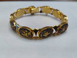 lot 57 image: IA Midas Signed Damascene Toledo Style Bracelet