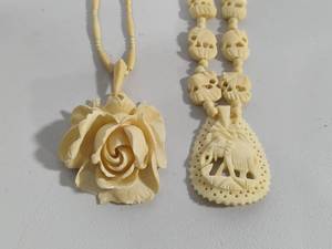 lot 53 image: Rose & Elephant Celluloid Necklaces