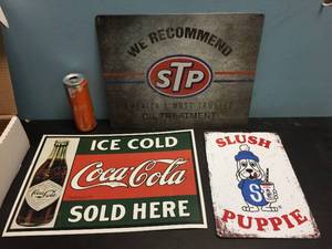 lot 102 image: 3 Metal Advertiser Signs Coca Cola - Slush Puppies - STP
