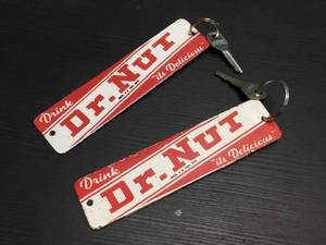 lot 107 image: 2 Vintage DR Nut Porcelain Crate TagRestroom Keys