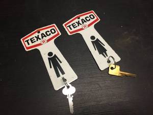 lot 213 image: Vintage Texaco - Porcelain Restroom Keys - Wow