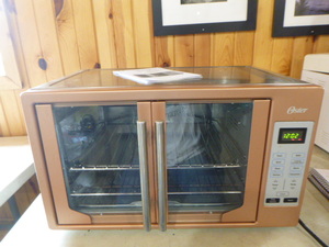 lot 147 image: Oster French Door Countertop Oven