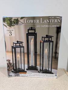 lot 17 image: TOWER LANTERN LED TAPERED CANDLE 3PK.