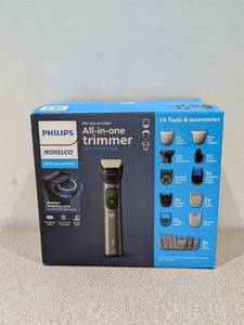 lot 72 image: PHILIPS NORELCO ULTIMATE PRECISION ALL-IN-ONE TRIMMER