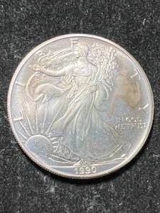 lot 29 image: 1990 AMERICAN SILVER EAGLE 1 TROY OZ .999 FINE SILVER