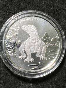 lot 62 image: 1 TROY OZ .999 FINE SILVER KOMODO DRAGON ROUND IN AIRTITE