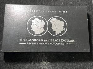 lot 102 image: 2023 US MORGAN AND PEACE DOLLAR REVERSE PROOF 2 COIN SET
