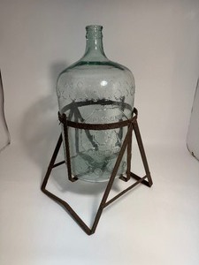 lot 1 image: Vintage Large Glass Water Bottle with Stand Arrowhead Puritas Waters Inc