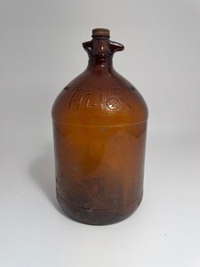 lot 5 image: Brown Glass Hi-Lex Bleach One Gallon Bottle Jug