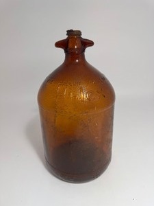 lot 6 image: Brown Glass Hi-Lex Bleach One Gallon Bottle Jug