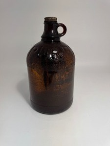 lot 7 image: Amber Brown Purex Half Gallon Jug Bottle
