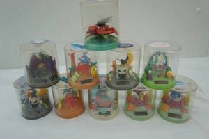 lot 45 image: Solar Powered Fluttering Figures (10ct)