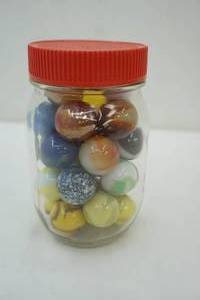 lot 187 image: Jar of Vintage Glass Marble Shooters