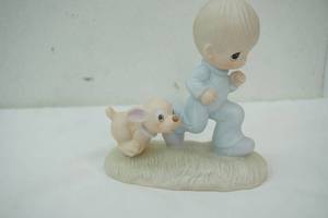 lot 281 image: Precious Moments Figurine Gods Speed