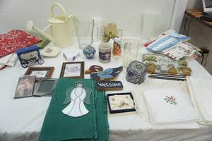 lot 311 image: Large Lot of linens, vases, glass pitcher, picture frames, candles, metal watering can