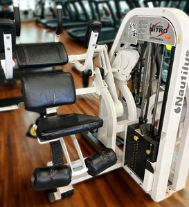lot 4 image: &nbspCommercial Grade Fitness Nautilus Nitro Abdominal Crunch Machine -keeps the upper & lower body stable to fully target the muscles -See Youtube For How Great This Crunch Machine Works We had a bit too much weight on it for Chloe -) 