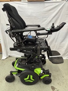 lot 8 image: Newer Permobil Power Seat Lift & Tilt Wheelchair - Super Nice Condition & Works However Joystick Screen Displays An Error Code - No Seat Cushion - Comers With Charger  Great For A Back Up Wheelchair or For Parts