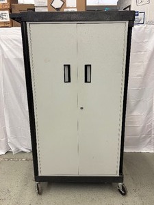 lot 27 image: Two-Door Portable Steel Storage Cabinet on Casters  Lockable Doors (New Key Needed). Perfect for Garage, Workshop, Office, or Home  Easy to Move & Secure Your Tools and Supplies Anywhere