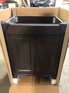 lot 7 image: Glacier Bay Delridge 25 in. Single Sink Chocolate Bath Vanity (Marble Top Not Included)   Customer Returns See Pictures