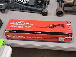 lot 507 image: Milwaukee M12 Fuel Red Lithium XC60V 8 Hedge Trimmer Kit (in original packaging)