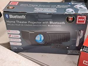 lot 518 image: RCA Bluetooth Home Theater Projector (in original packaging)