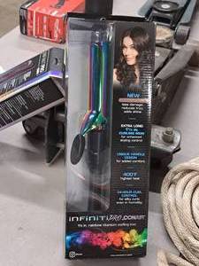 lot 530 image: Conair Infinity Pro 1-14 Rainbow Titanium Curling Iron (in original packaging)