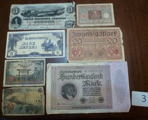 lot 3 image: Variety of paper money and insurance certificate