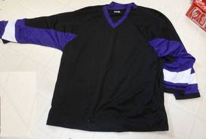 lot 15 image: 2 size XL black and purple hockey jerseys