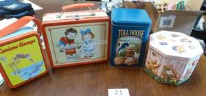lot 21 image: FOUR collectible tins all new or like new