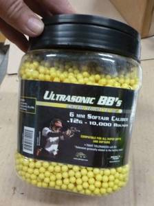 lot 30 image: Jar of 10,000 softair BBs