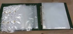 lot 41 image: folder with about 30 8-12x11 photo pages and 12 ziplock pages for crafts or fishing stuff